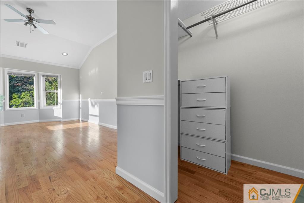 33 Hazel Avenue Edison, NJ 08820 - Photo 28 of 52 a view of walk in closet with empty racks