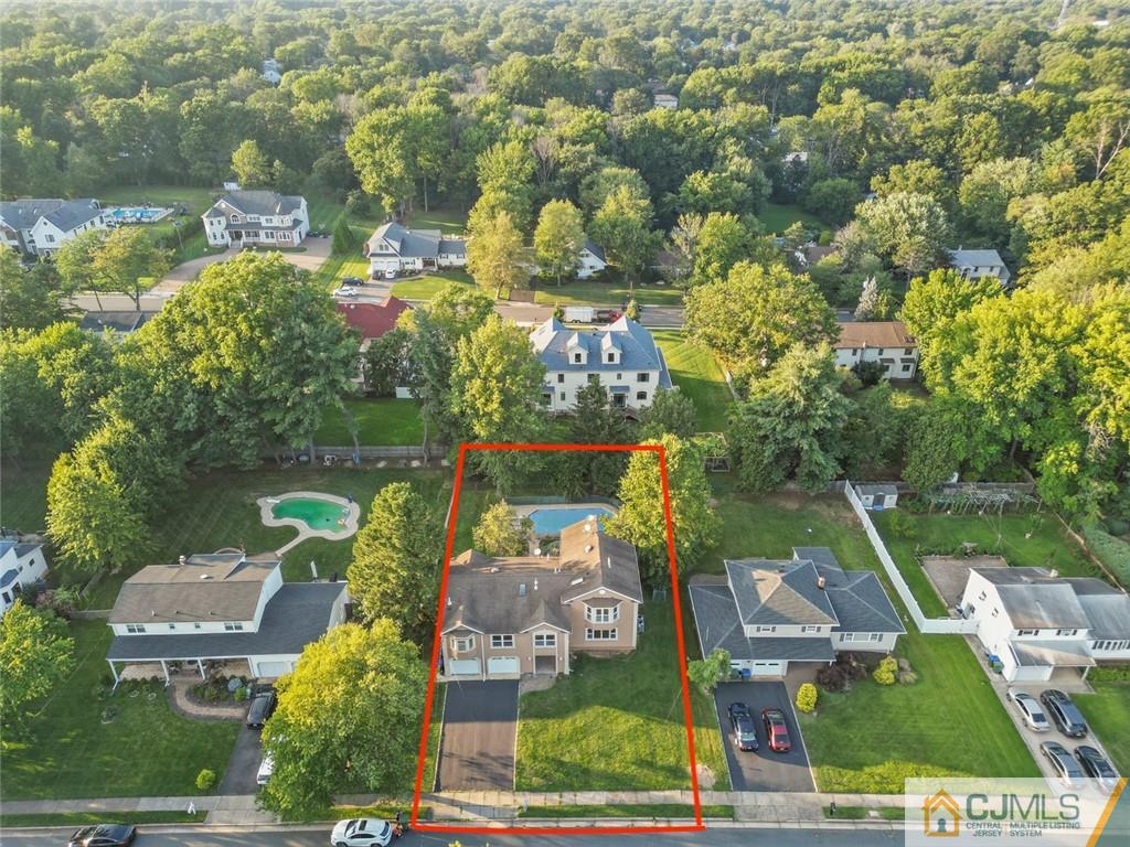 33 Hazel Avenue Edison, NJ 08820 - Photo 3 of 52 an aerial view of house with yard swimming pool and outdoor seating
