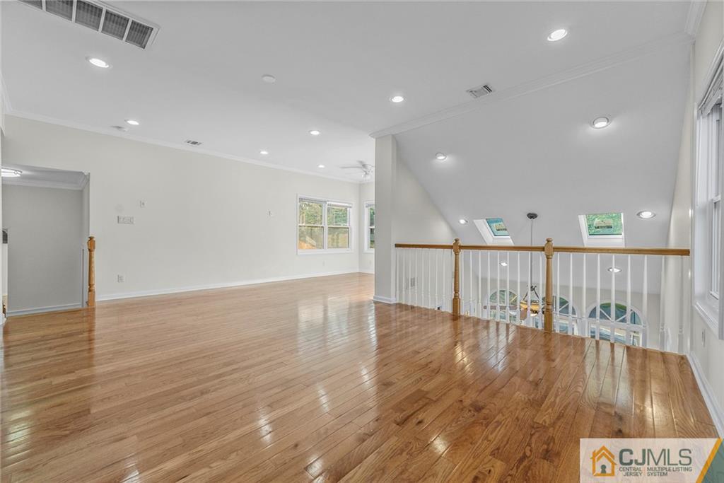 33 Hazel Avenue Edison, NJ 08820 - Photo 31 of 52 a view of room with wooden floor