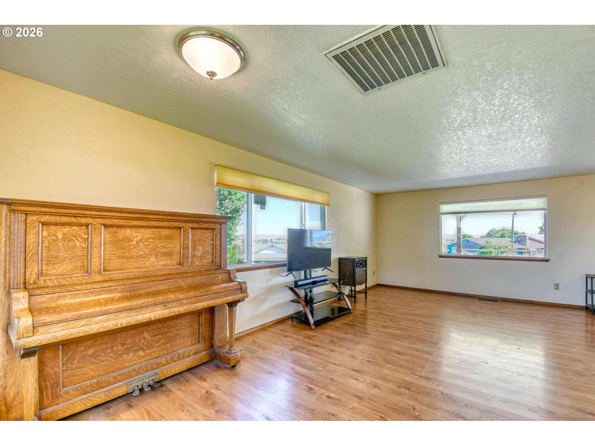 1107 Southwest 23rd Street Pendleton, OR 97801 - Photo 10 of 42 a view of a room with furniture and wooden floor