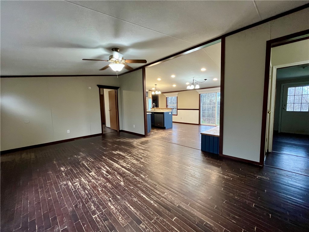 11834 Tellier Road Wolcott, NY 14590 - Photo 26 of 42 Living room with cathedral ceiling