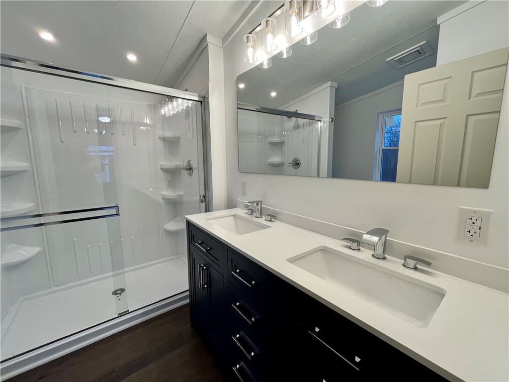 11834 Tellier Road Wolcott, NY 14590 - Photo 33 of 42 1st floor bathroom to primary bedroom