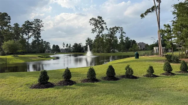 a view of a park with swings and slides