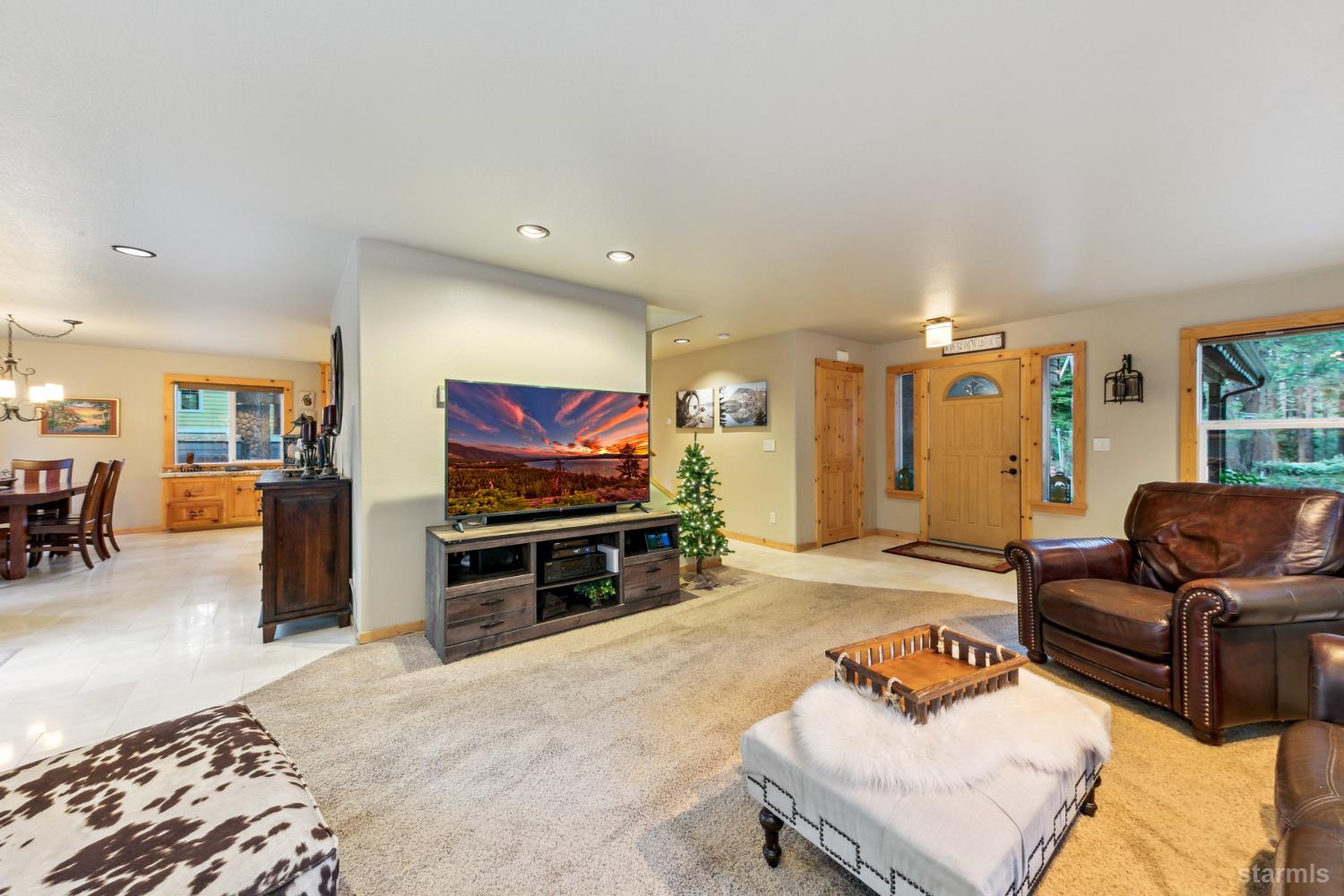 817 Kiowa Drive South Lake Tahoe, CA 96150 - Photo 11 of 39 a living room with furniture and a flat screen tv