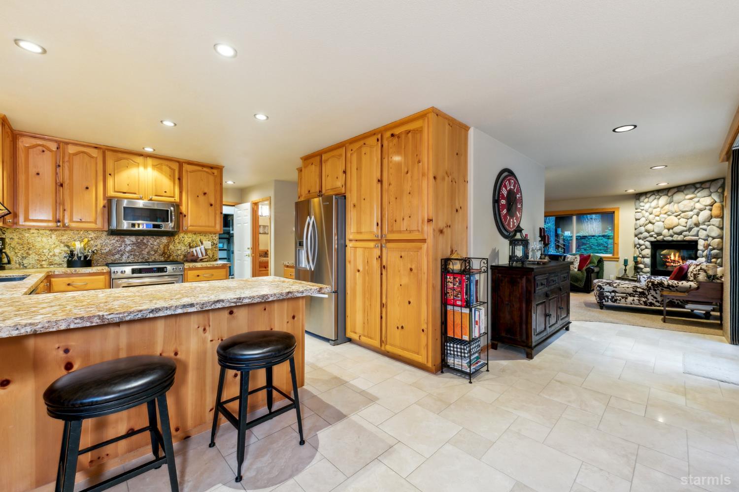 817 Kiowa Drive South Lake Tahoe, CA 96150 - Photo 14 of 39 a view of kitchen center island and stainless steel appliances