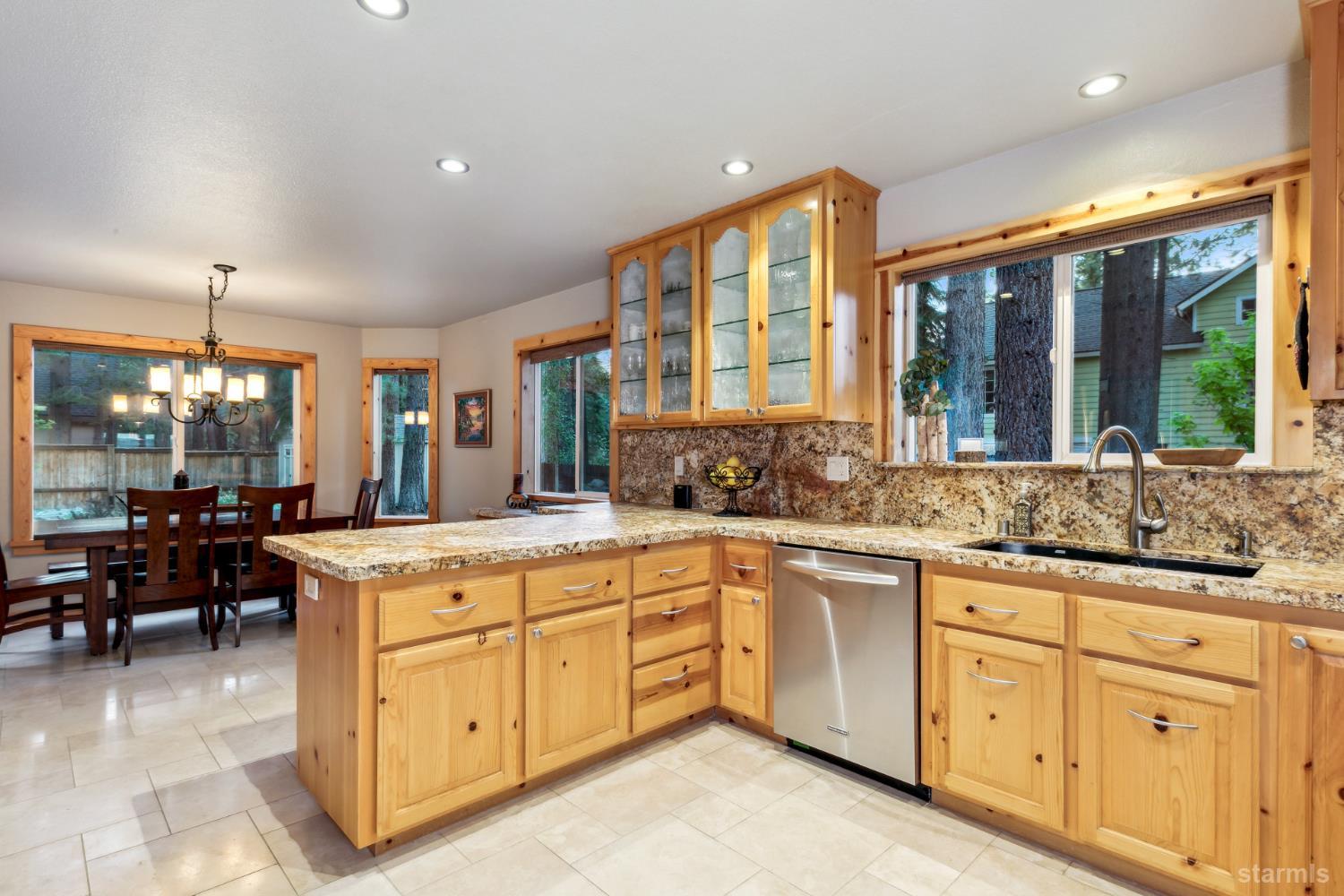 817 Kiowa Drive South Lake Tahoe, CA 96150 - Photo 17 of 39 a kitchen with sink stove and cabinets