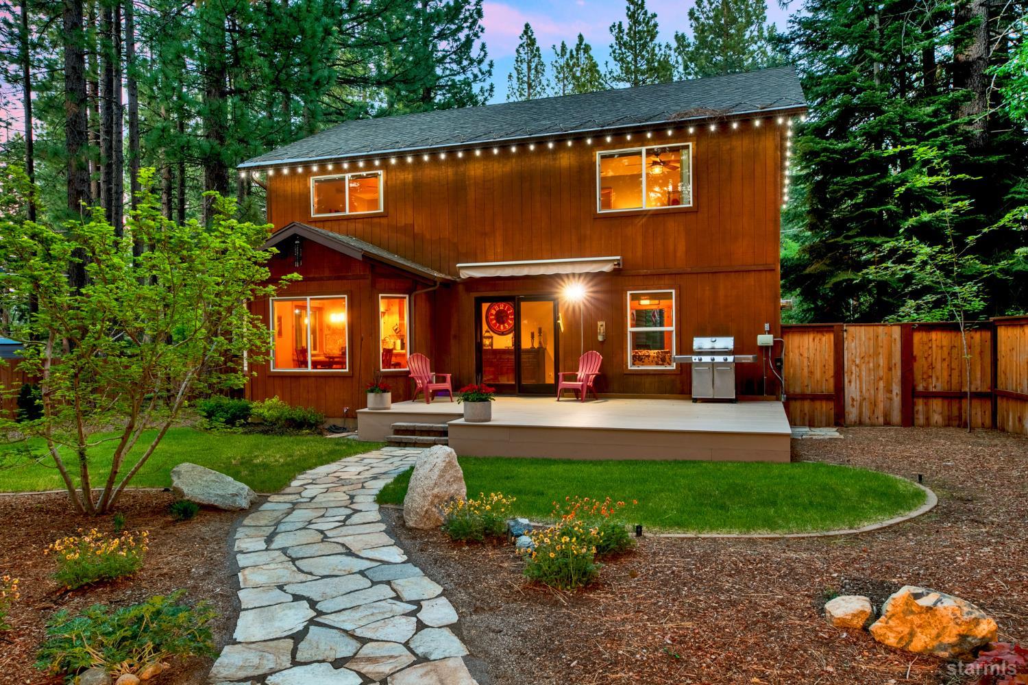 817 Kiowa Drive South Lake Tahoe, CA 96150 - Photo 20 of 39 a view of a house with a yard