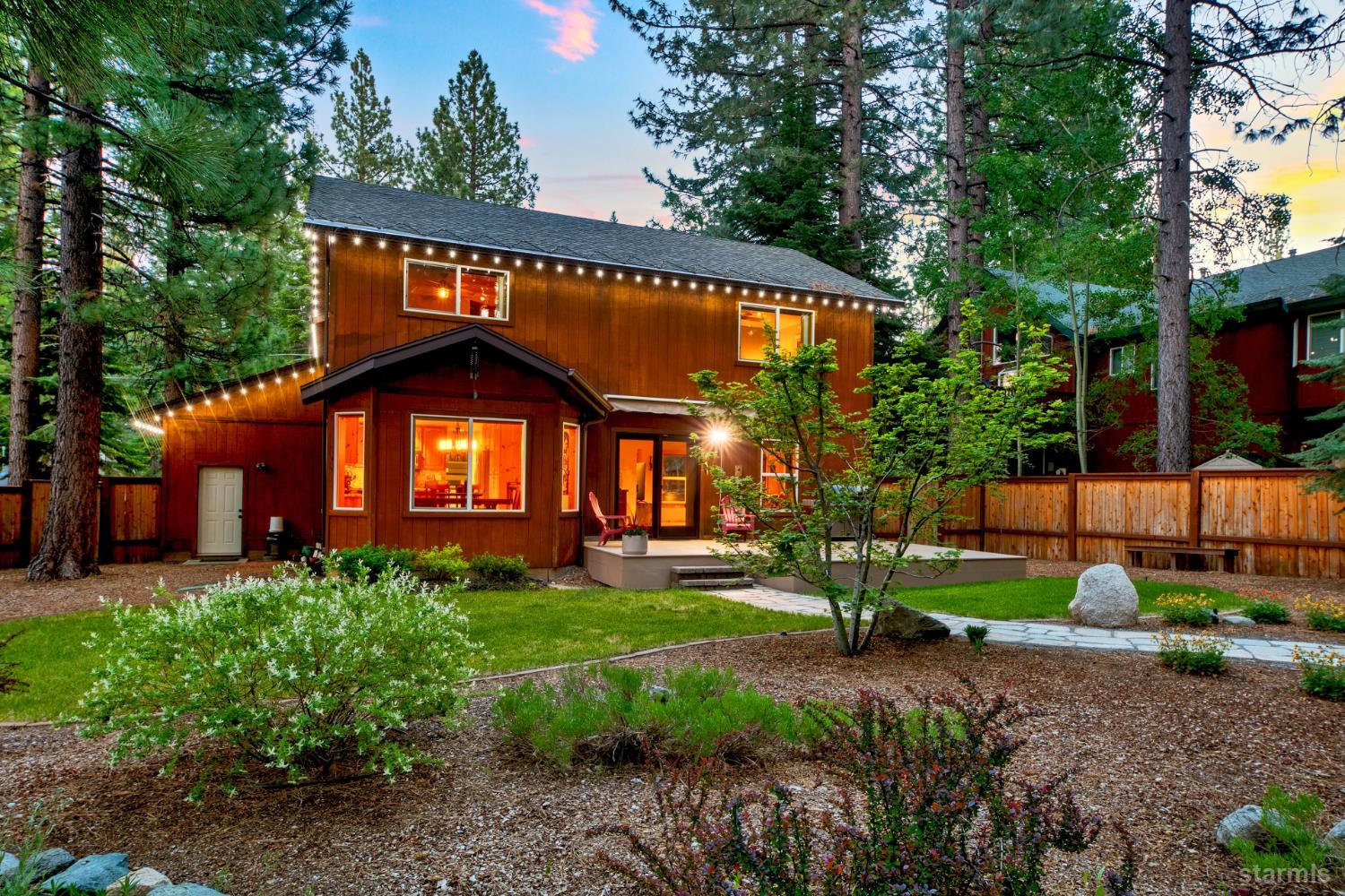 817 Kiowa Drive South Lake Tahoe, CA 96150 - Photo 21 of 39 a front view of a house with garden