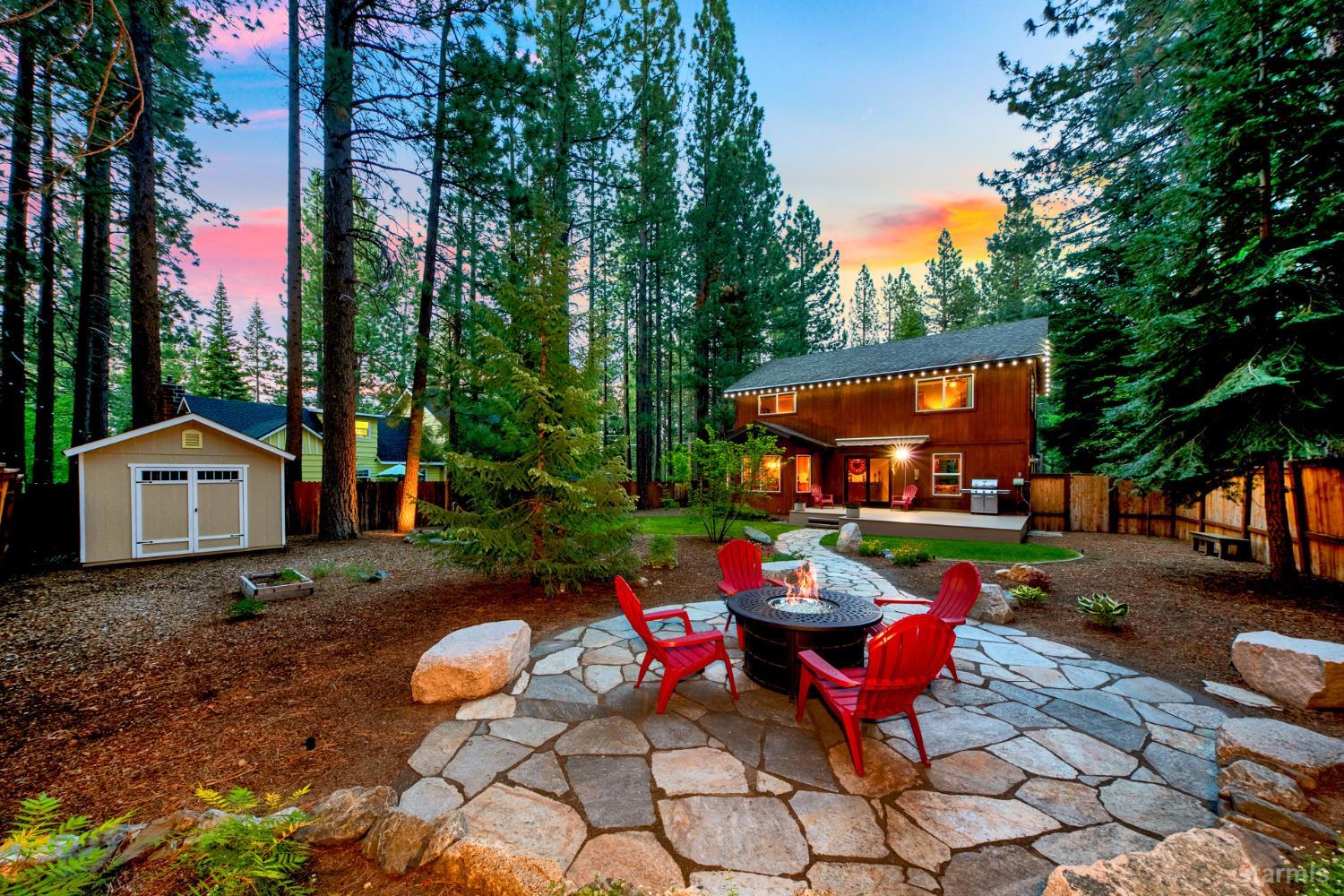 817 Kiowa Drive South Lake Tahoe, CA 96150 - Photo 22 of 39 a view of a chairs and table in backyard