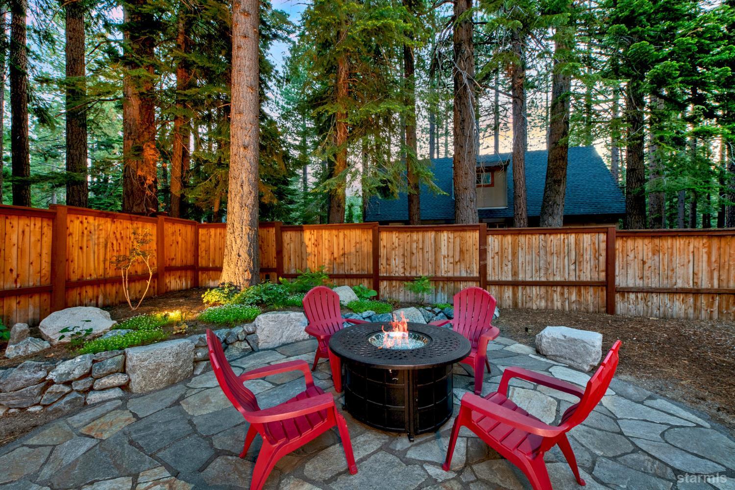 817 Kiowa Drive South Lake Tahoe, CA 96150 - Photo 23 of 39 a view of a backyard with sitting area