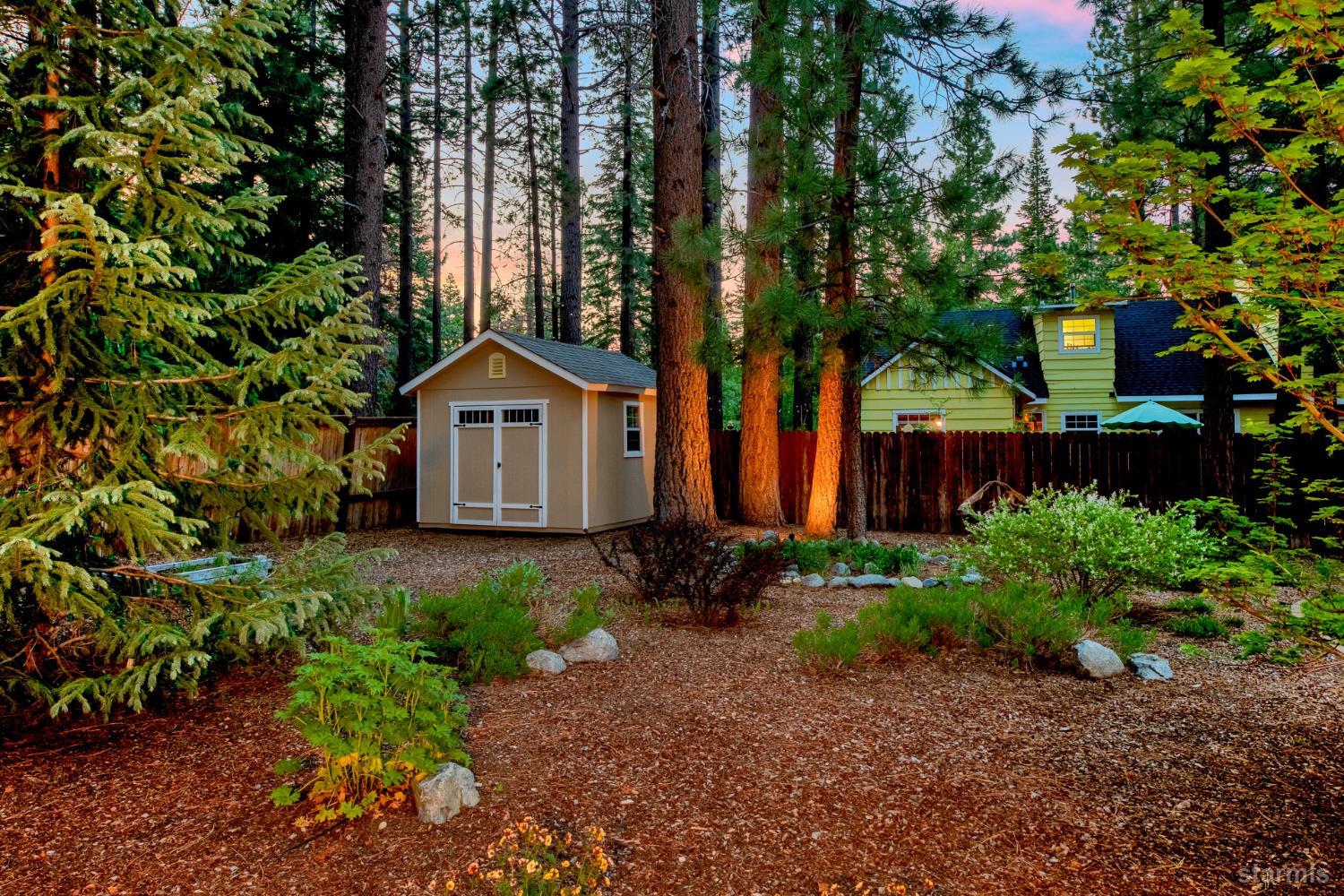 817 Kiowa Drive South Lake Tahoe, CA 96150 - Photo 24 of 39 a house with trees in the background