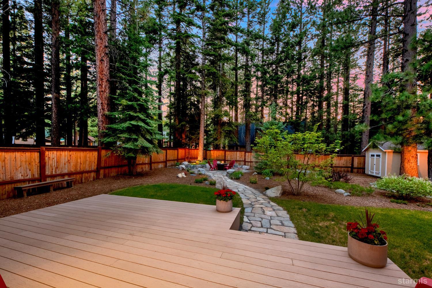 817 Kiowa Drive South Lake Tahoe, CA 96150 - Photo 3 of 39 a view of a park with plants and large trees