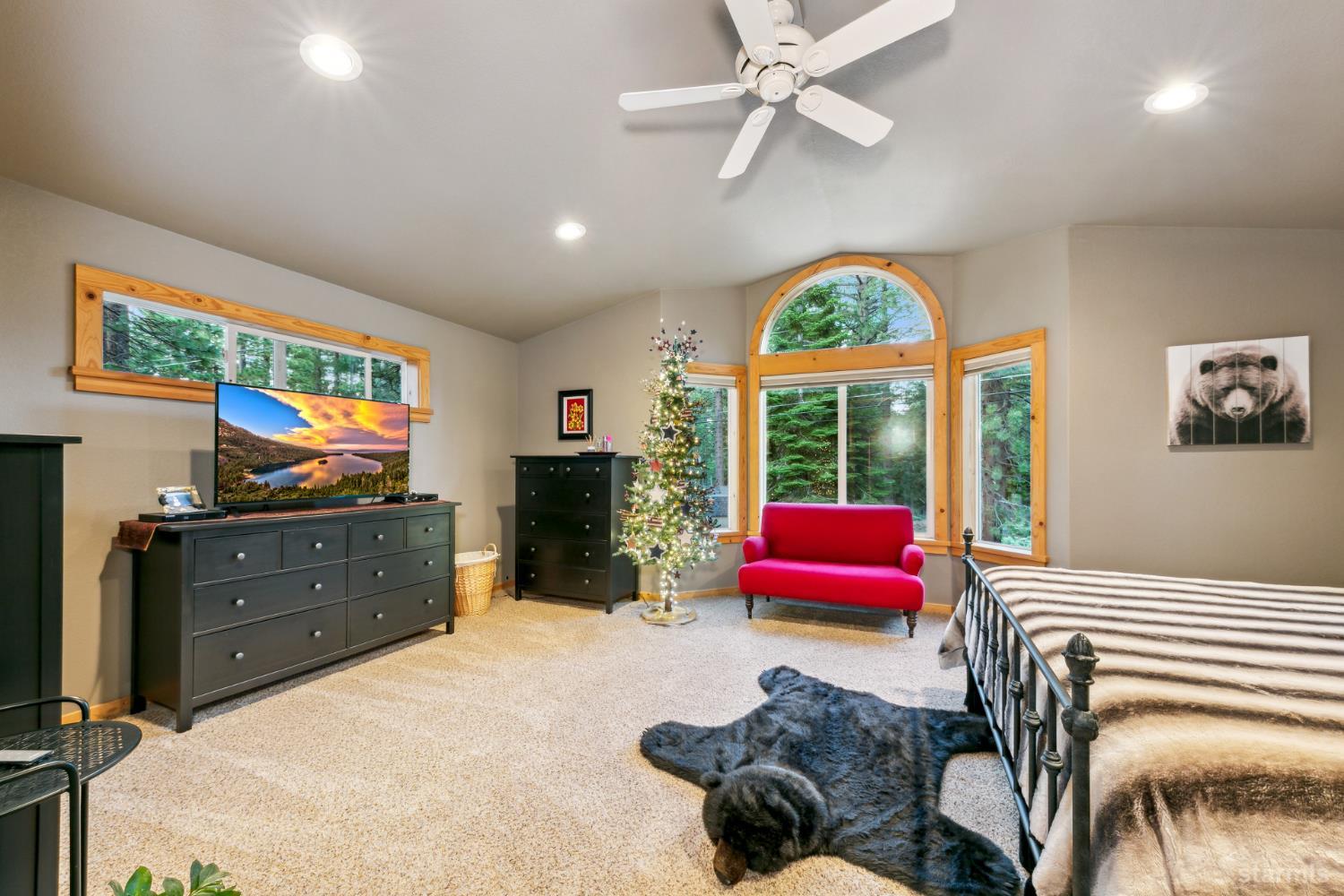 817 Kiowa Drive South Lake Tahoe, CA 96150 - Photo 32 of 39 a bedroom with a bed and a window