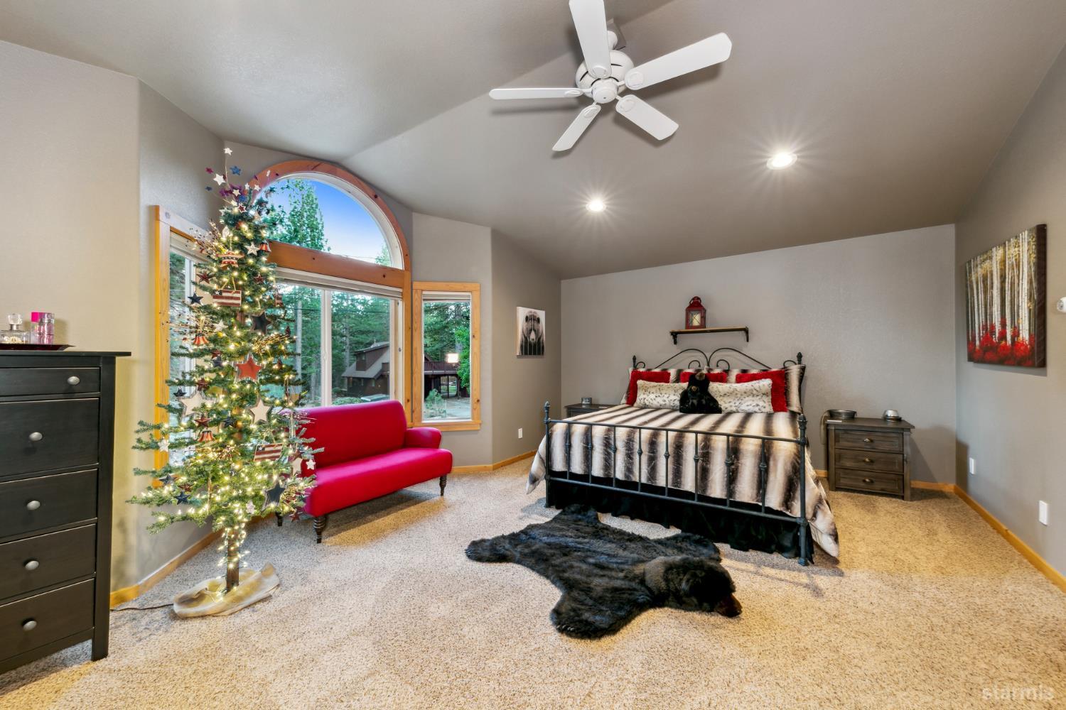 817 Kiowa Drive South Lake Tahoe, CA 96150 - Photo 33 of 39 a bedroom with furniture and a bed