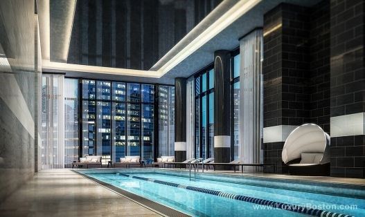 a front view of a building with glass windows and door