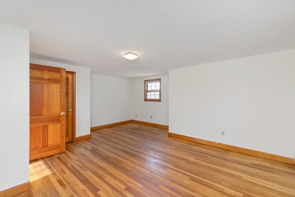 145 Warrenton Road Haverhill, MA 01832 - Photo 19 of 38 a view of an empty room and wooden floor