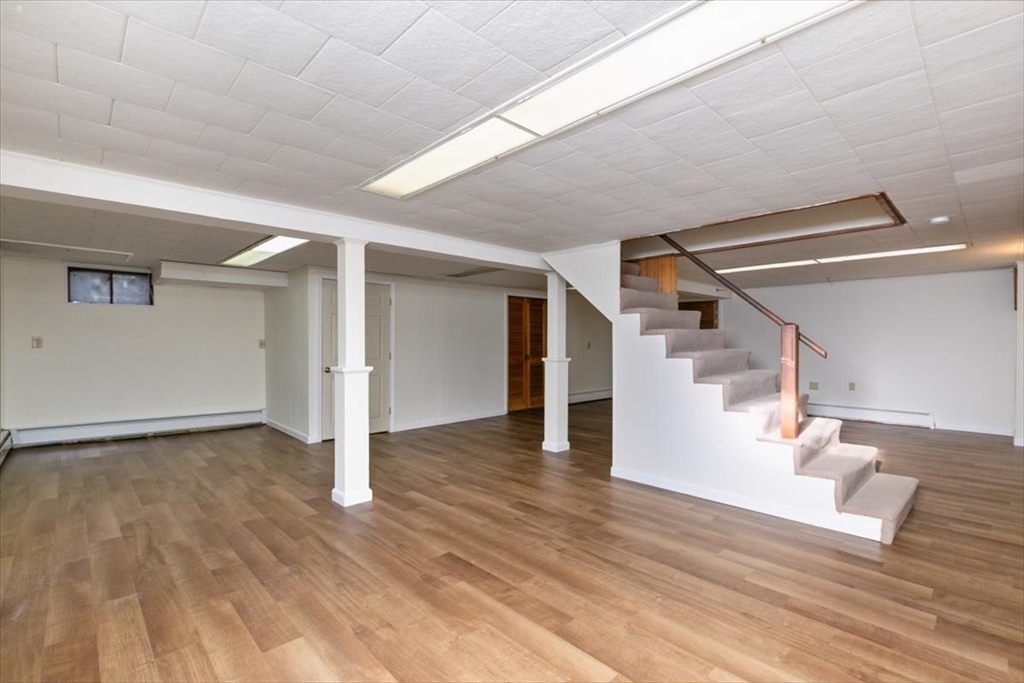 145 Warrenton Road Haverhill, MA 01832 - Photo 28 of 38 a view of an empty room with wooden floor