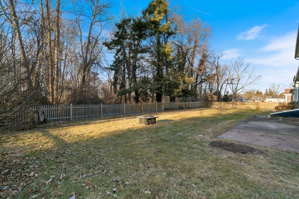 145 Warrenton Road Haverhill, MA 01832 - Photo 33 of 38 a view of yard with swimming pool and trees