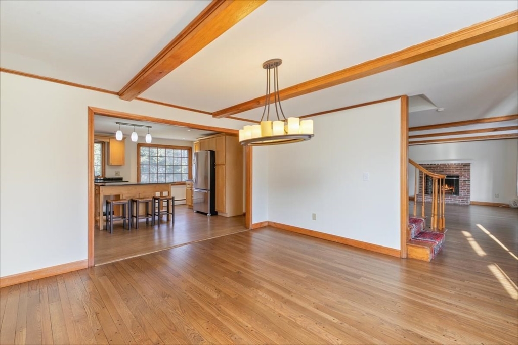 145 Warrenton Road Haverhill, MA 01832 - Photo 10 of 38 a view of dining room with furniture and wooden floor