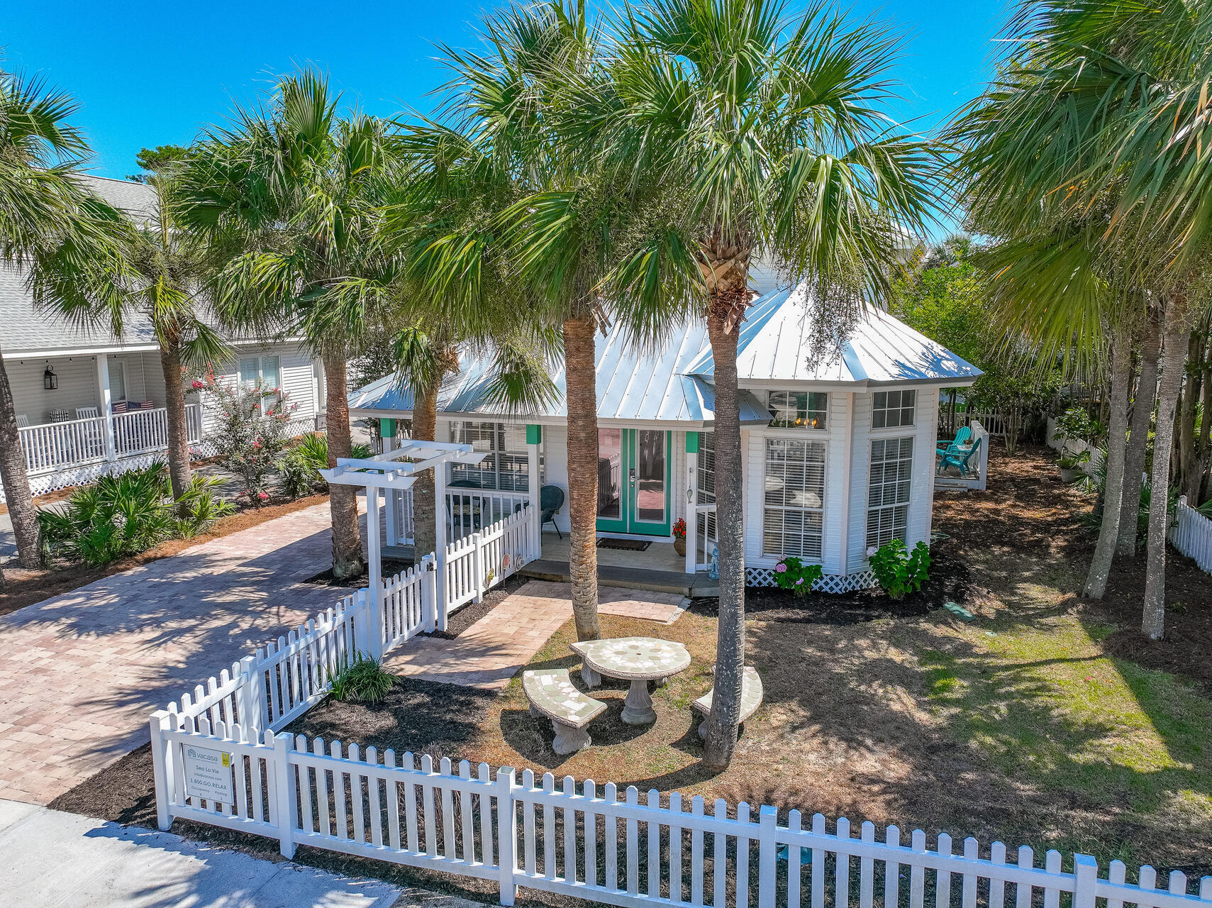 4467 Clipper Cove Destin, FL 32541 - Photo 1 of 48 a front view of house with yard nad seating space