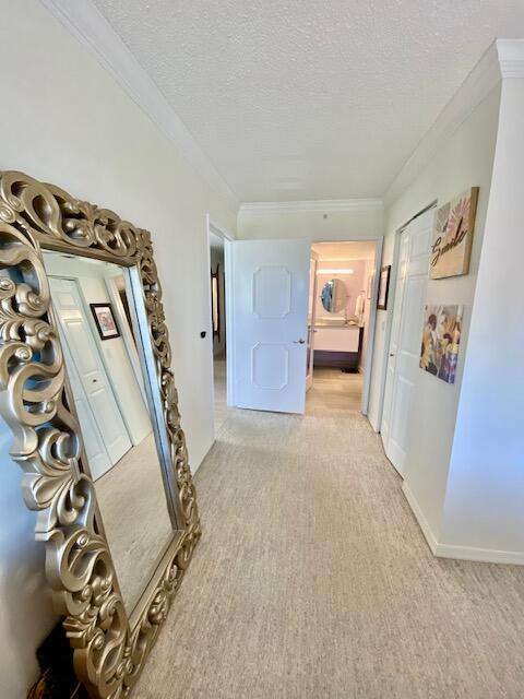 3594 South Ocean Boulevard, Unit 207 Highland Beach, FL 33487 - Photo 12 of 56 a view of livingroom with furniture and windows