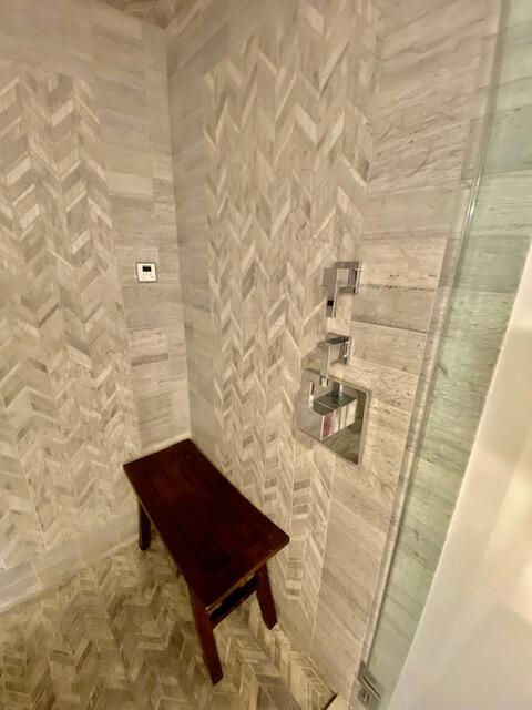 3594 South Ocean Boulevard, Unit 207 Highland Beach, FL 33487 - Photo 18 of 56 a bathroom with a shower