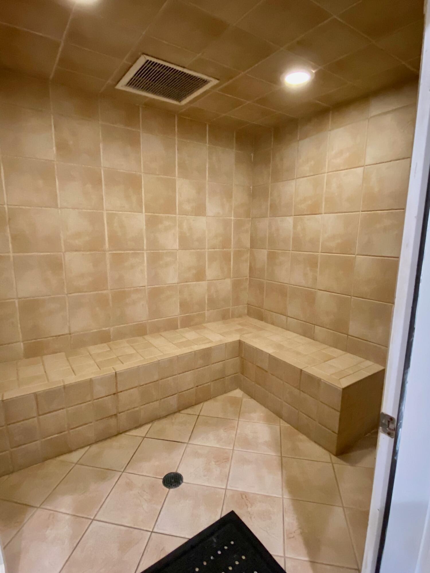 3594 South Ocean Boulevard, Unit 207 Highland Beach, FL 33487 - Photo 45 of 56 a bathroom with a shower
