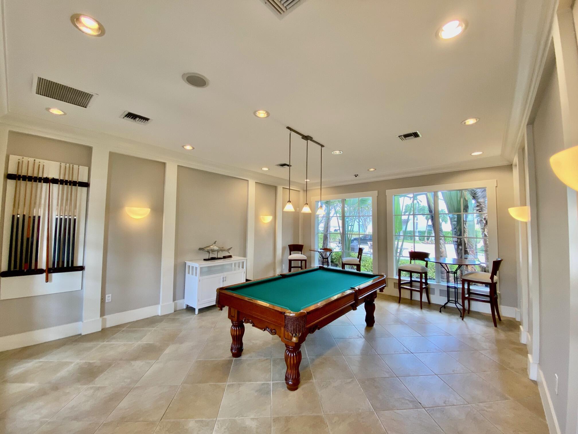3594 South Ocean Boulevard, Unit 207 Highland Beach, FL 33487 - Photo 46 of 56 a room with pool table and windows