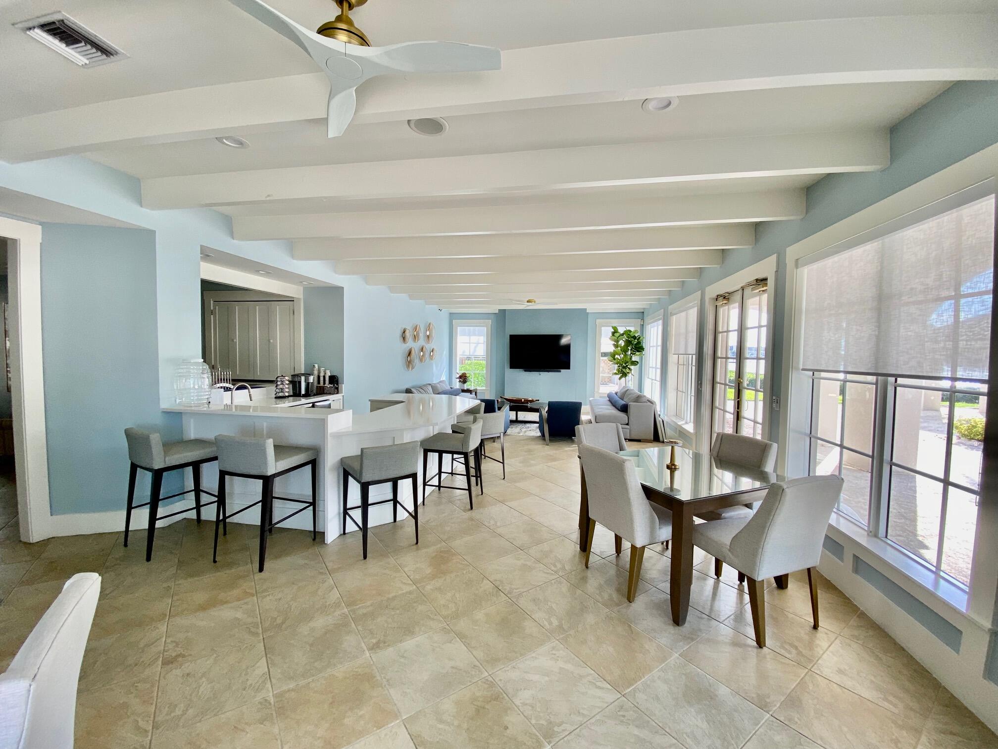 3594 South Ocean Boulevard, Unit 207 Highland Beach, FL 33487 - Photo 49 of 56 a view of a dining room with furniture