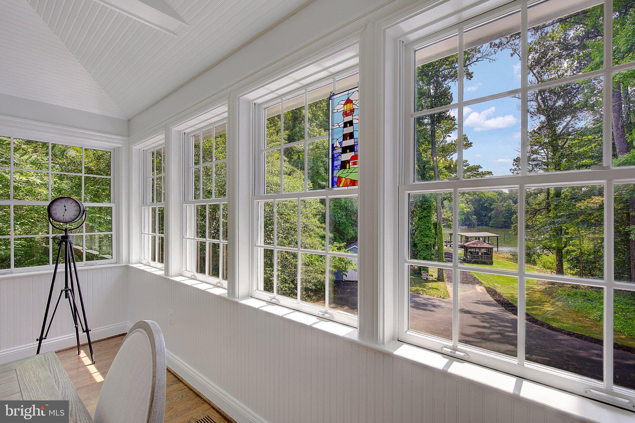 980 Apple Lane Solomons, MD 20629 - Photo 21 of 82 Sunlit serenity with nature views.