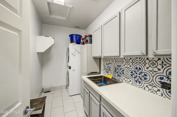 a view of a backyard with a patio