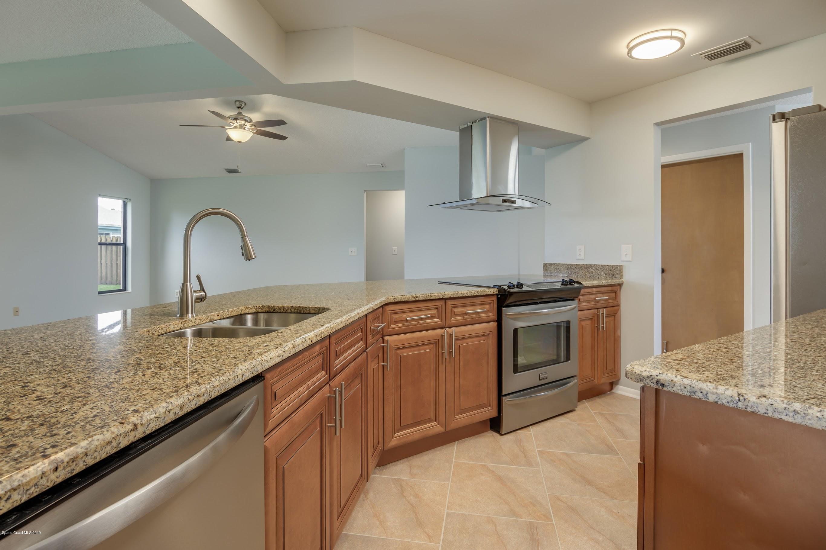 135 Twin Lakes Road Melbourne, FL 32901 - Photo 6 of 25 81261B92-CF26-49FB-80C2-2DA4519AEE5F