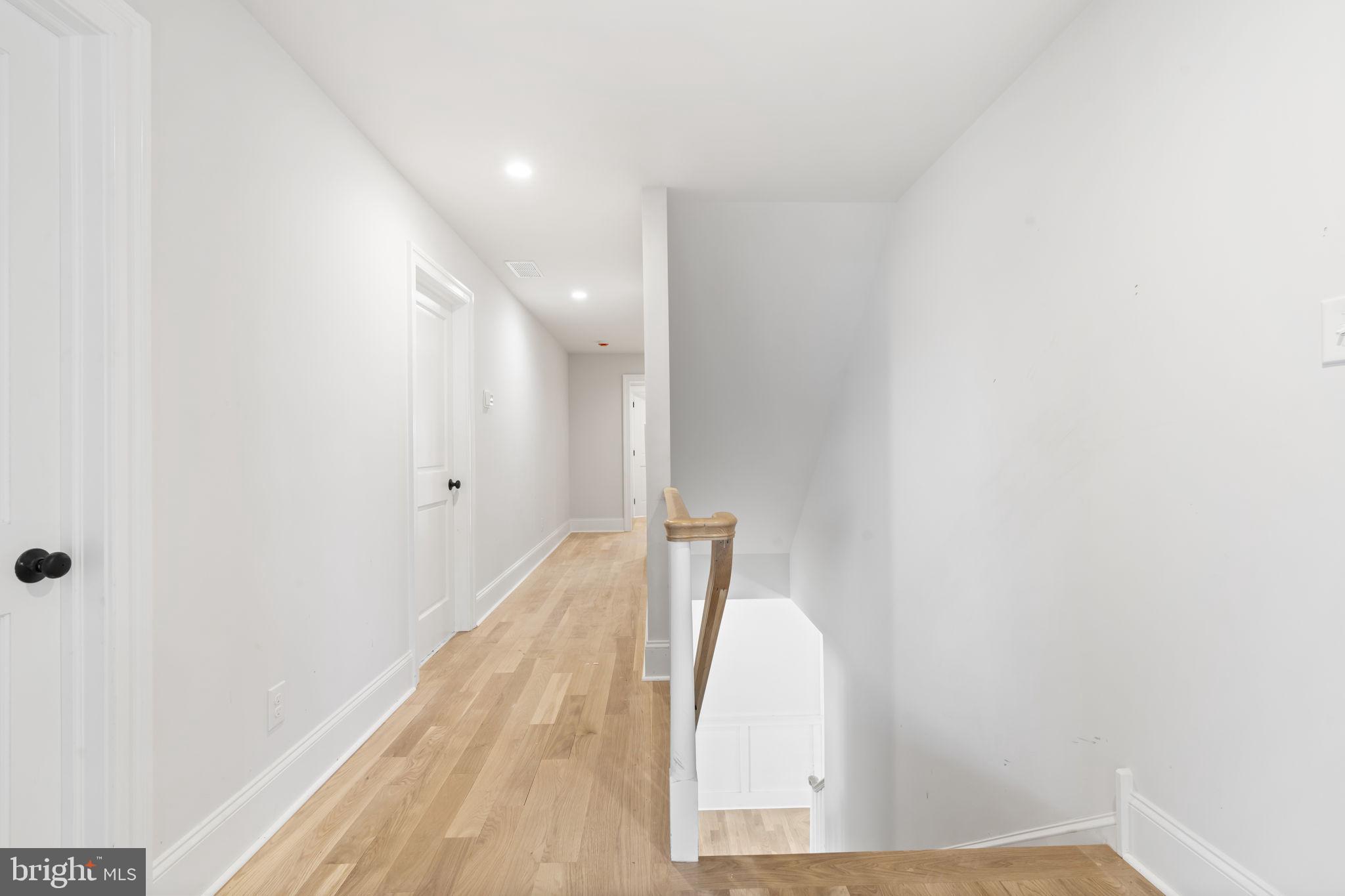 39 Simpson Road Ardmore, PA 19003 - Photo 21 of 49 a view of hallway with wooden floor