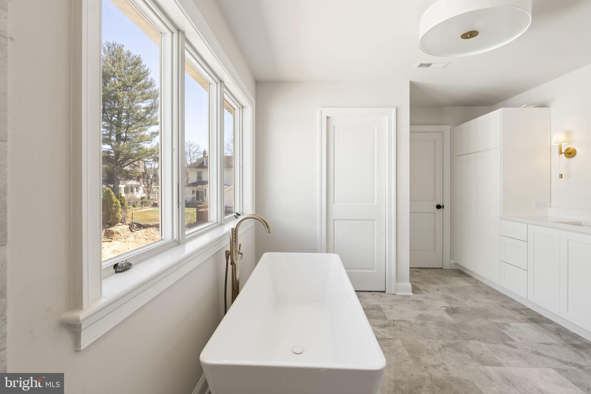 39 Simpson Road Ardmore, PA 19003 - Photo 30 of 49 a view of a hallway with windows