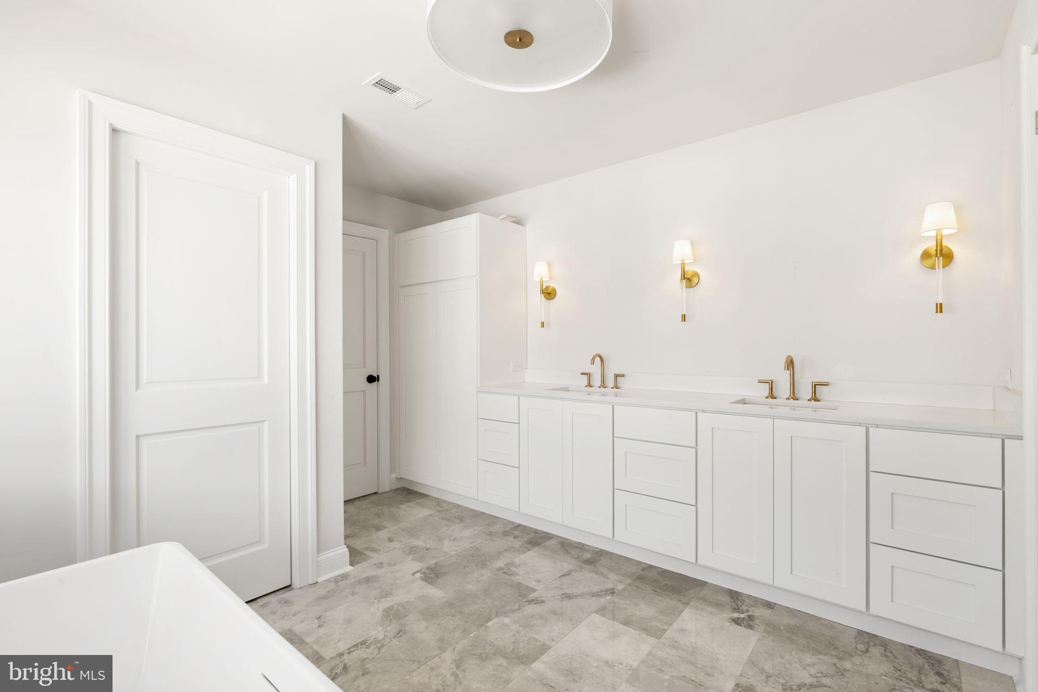 39 Simpson Road Ardmore, PA 19003 - Photo 31 of 49 a view of a hallway to closet and utility room