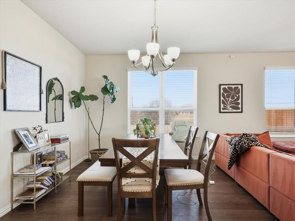312 Welch Folly Lane Aledo, TX 76008 - Photo 13 of 33 a living room with furniture a chandelier and a window