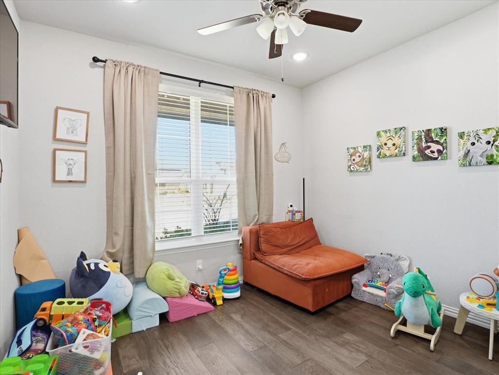 312 Welch Folly Lane Aledo, TX 76008 - Photo 18 of 33 a living room with furniture and a wooden floor