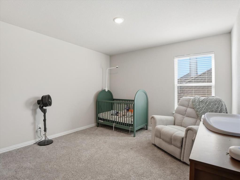 312 Welch Folly Lane Aledo, TX 76008 - Photo 23 of 33 a living room with furniture a window and a chandelier