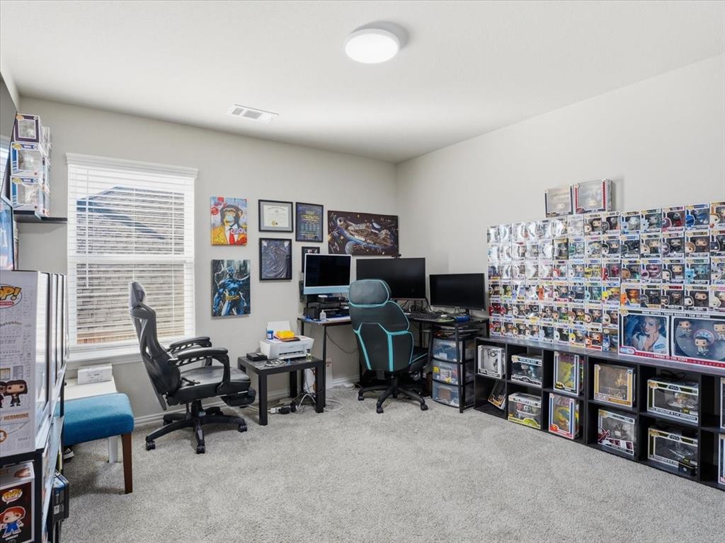 312 Welch Folly Lane Aledo, TX 76008 - Photo 24 of 33 a view of a livingroom with workspace and a window