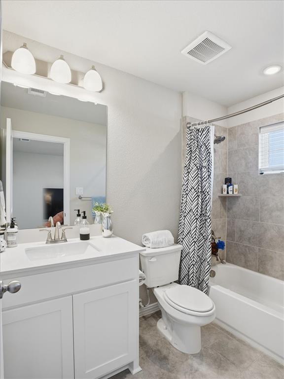 312 Welch Folly Lane Aledo, TX 76008 - Photo 27 of 33 a bathroom with a sink a toilet and shower