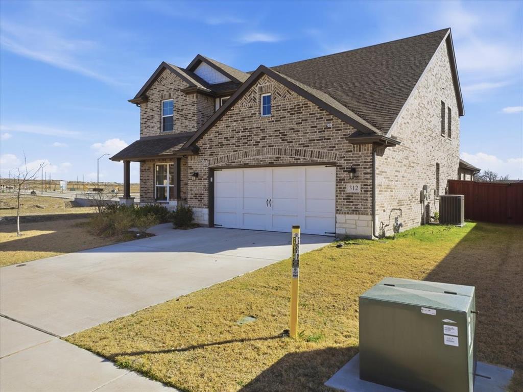 312 Welch Folly Lane Aledo, TX 76008 - Photo 6 of 33 front view of house with an outdoor space