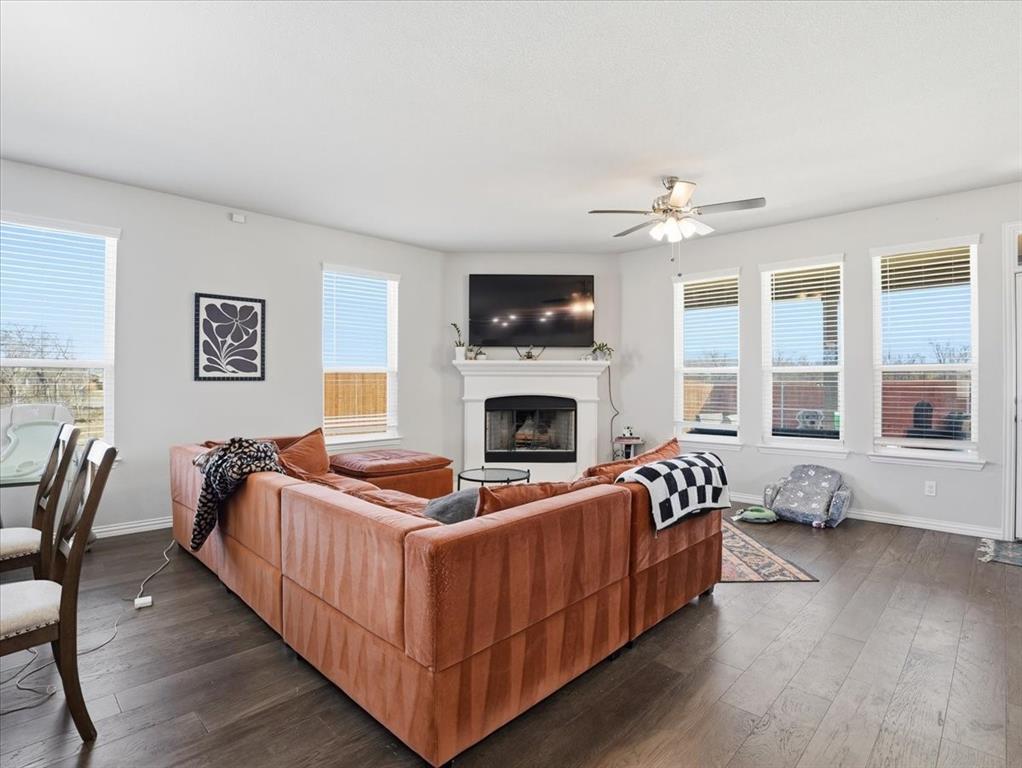 312 Welch Folly Lane Aledo, TX 76008 - Photo 8 of 33 a living room with furniture fireplace and flat screen tv