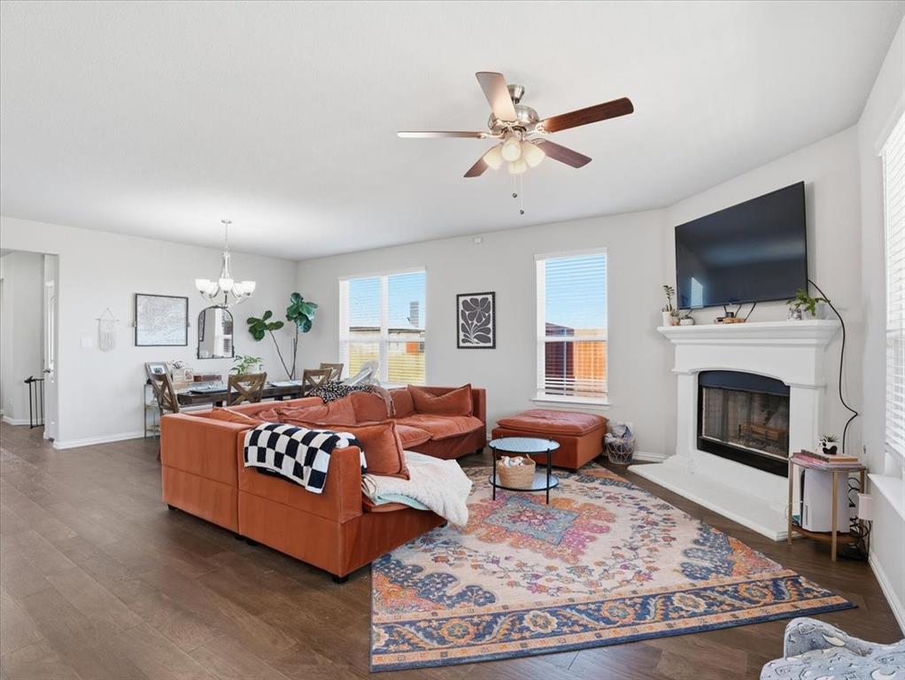312 Welch Folly Lane Aledo, TX 76008 - Photo 9 of 33 a living room with fireplace furniture and a flat screen tv
