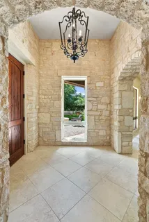 a view of entryway with a front door