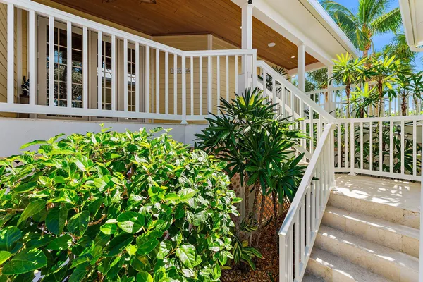 a porch with a table in balcony