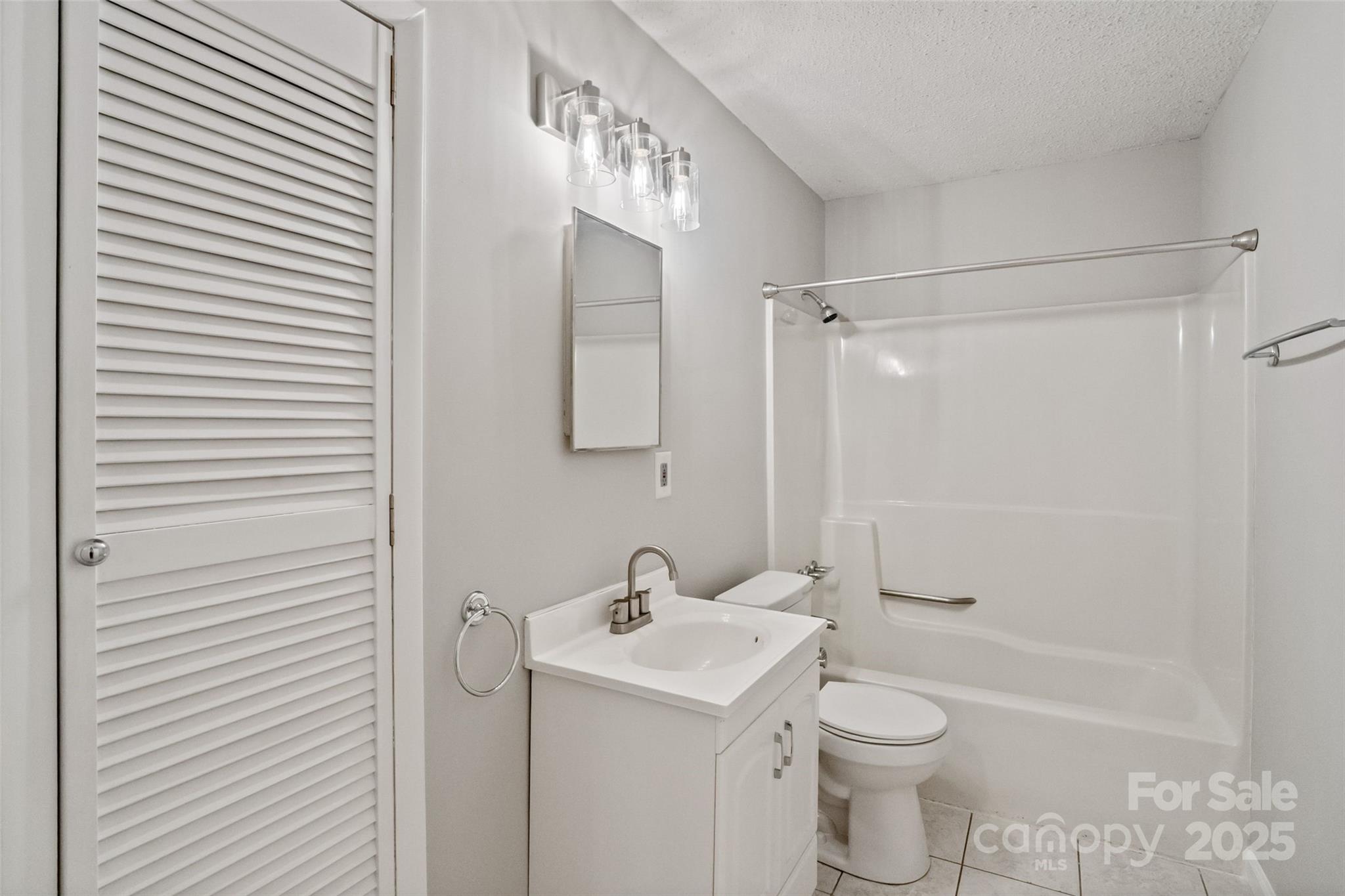 29 7th Street York, SC 29745 - Photo 14 of 22 a bathroom with a sink toilet and shower