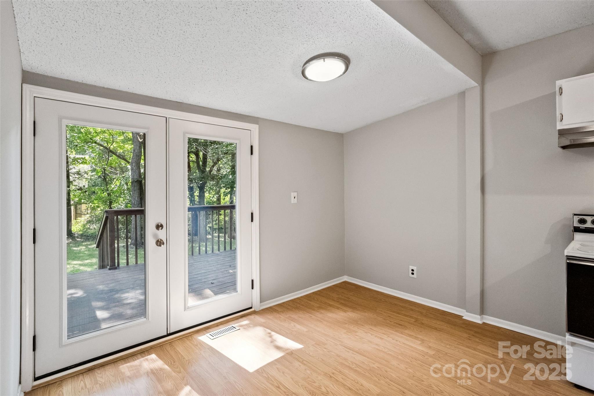 29 7th Street York, SC 29745 - Photo 15 of 22 a view of empty room with wooden floor and fan