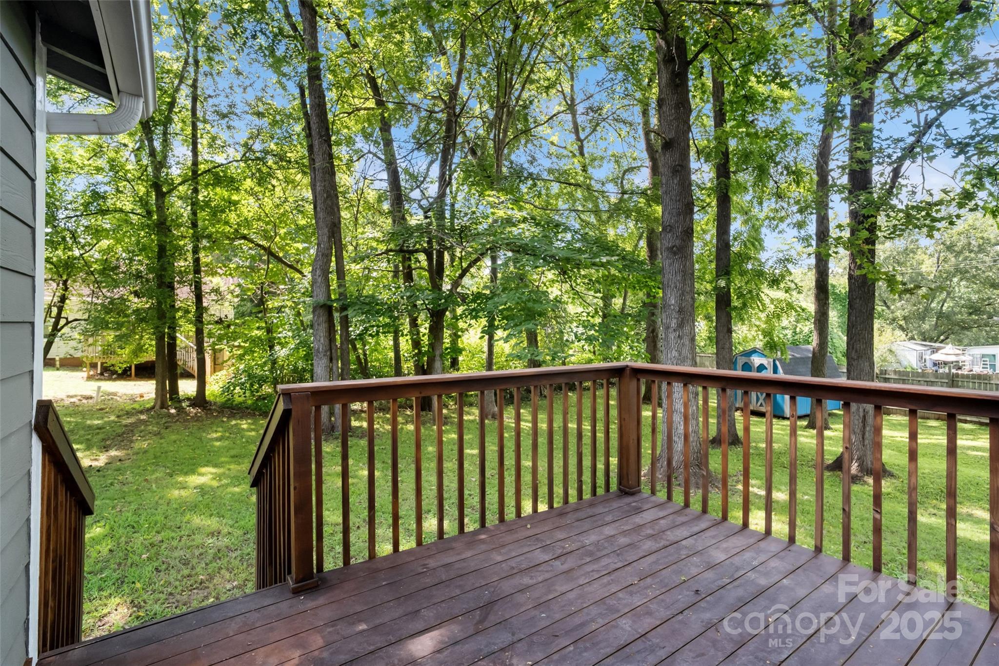 29 7th Street York, SC 29745 - Photo 19 of 22 a balcony with trees in front of it