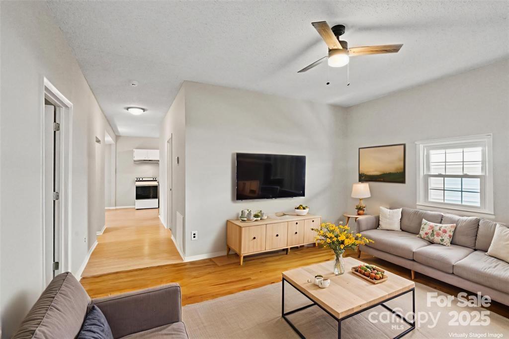 29 7th Street York, SC 29745 - Photo 5 of 22 a living room with furniture and a flat screen tv