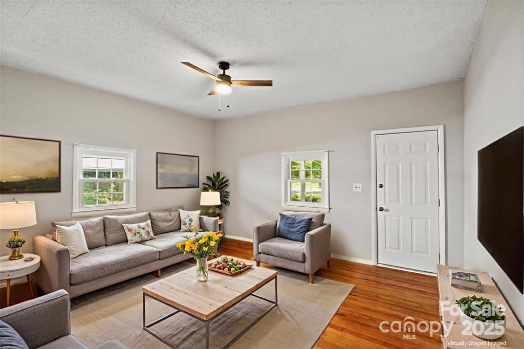 29 7th Street York, SC 29745 - Photo 6 of 22 a living room with furniture a flat screen tv and a window